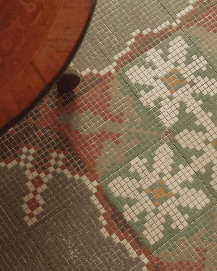 Floral mosaic on the farmhouse floor
